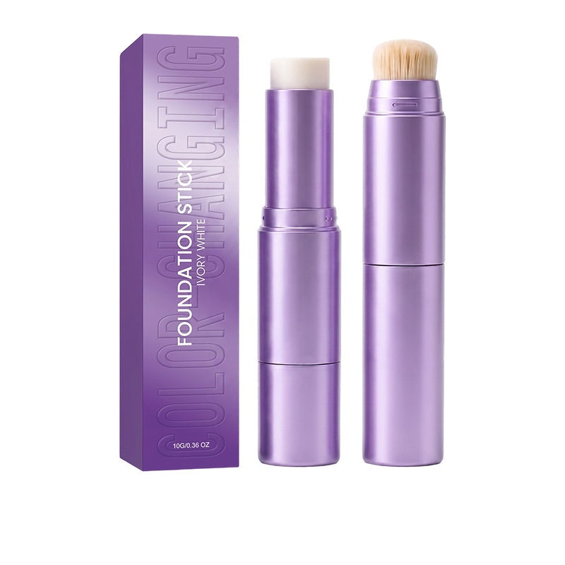 Ivory color-changing foundation stick in its purple tube and packaging