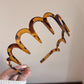 ❣️2025 Hot Sale❣️U-Shape Fashion Tooth Hair Comb Headband