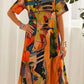 Flowing Dress In Bright Tropical Colors